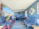 Inviting covered porch with comfortable seating, perfect for relaxing and enjoying the outdoors at 3104 E Broadway Rd # 212, Mesa, AZ 85204