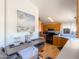 Efficient kitchen with ample counter space, wood floors, and light wood cabinets at 3104 E Broadway Rd # 212, Mesa, AZ 85204