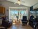 Cozy living area with plenty of natural light, comfortable recliners and modern decor at 3104 E Broadway Rd # 212, Mesa, AZ 85204