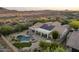 Beautiful desert home with large pool, spa, fire pit and covered patio at 31703 N 15Th Dr, Phoenix, AZ 85085