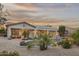 A relaxing backyard with a pool, outdoor seating, and fire pit at 31703 N 15Th Dr, Phoenix, AZ 85085