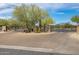 Gated entrance to a community with brick paved entry at 31703 N 15Th Dr, Phoenix, AZ 85085