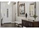 Warm and welcoming entryway with bench and console table at 31703 N 15Th Dr, Phoenix, AZ 85085