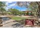 Playground with covered picnic area, play structure and shade in the community park at 31703 N 15Th Dr, Phoenix, AZ 85085
