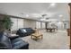 Spacious recreation room featuring comfortable seating and billiard table at 31703 N 15Th Dr, Phoenix, AZ 85085
