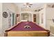 Entertaining game room with a pool table, ceiling fan, and neutral paint at 3207 E Behrend Dr, Phoenix, AZ 85050