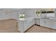 Bright, updated kitchen featuring a center island, stainless steel appliances, and backyard view at 3307 N Apollo Dr, Chandler, AZ 85224