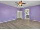 View of the spacious bedroom leading into the ensuite bathroom at 3421 S 256Th Ave, Buckeye, AZ 85326