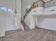 Bright foyer with a staircase, chandelier, high ceilings, and mixed flooring at 3421 S 256Th Ave, Buckeye, AZ 85326