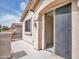 This is an exterior view of the upstairs patio with sliding door and nice architecture at 3421 S 256Th Ave, Buckeye, AZ 85326