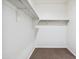 Spacious walk-in closet with ample shelving and storage space, perfect for organization at 35566 N Breezy Ln, San Tan Valley, AZ 85140
