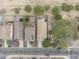 High angle shot showing house roof tops, an adjacent grassy field, neighborhood streets and neat landscaping at 35624 N Zachary Rd, San Tan Valley, AZ 85144