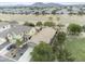 Wide aerial shot of home with mountain views, a well-kept yard, and a paved driveway at 35624 N Zachary Rd, San Tan Valley, AZ 85144