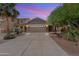 Charming two-story home with a spacious driveway and desert landscaping at 35624 N Zachary Rd, San Tan Valley, AZ 85144