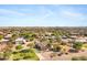 This view offers a broad look at the community showcasing desert landscaping, wide streets, and mountain views at 4187 E Triple Crown Dr, San Tan Valley, AZ 85140