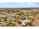 This view highlights the neighborhood with desert landscape and mountain views in the distance at 4187 E Triple Crown Dr, San Tan Valley, AZ 85140