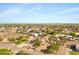 This view highlights a well-maintained home with desert landscaping in a beautiful community at 4187 E Triple Crown Dr, San Tan Valley, AZ 85140