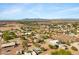 This view shows the expansive community and distant mountain views at 4187 E Triple Crown Dr, San Tan Valley, AZ 85140