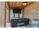 Covered patio featuring a hot tub and mounted television for outdoor enjoyment at 4187 E Triple Crown Dr, San Tan Valley, AZ 85140