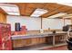 Workshop featuring workbench with pegboard, tool chest, and bright lighting perfect for DIY projects at 4187 E Triple Crown Dr, San Tan Valley, AZ 85140