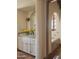 Bathroom with vanity, patterned tile, and arched doorway to tub at 4747 E Arroyo Verde Dr, Paradise Valley, AZ 85253