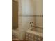 Bathroom featuring tiled shower and bathtub with patterned trim at 4747 E Arroyo Verde Dr, Paradise Valley, AZ 85253