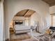 Bedroom featuring a neutral color palette, vaulted ceilings, and arched entryway at 4747 E Arroyo Verde Dr, Paradise Valley, AZ 85253