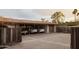 Long private garage with space for three cars and an attached wooden gate at 4747 E Arroyo Verde Dr, Paradise Valley, AZ 85253