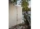 Stylish outdoor shower with a private wall, adjacent to cactus plants and greenery by the pool at 4747 E Arroyo Verde Dr, Paradise Valley, AZ 85253