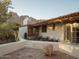 Patio with red tiled floor, white plaster walls, small staircase and mountain views at 4747 E Arroyo Verde Dr, Paradise Valley, AZ 85253