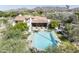 Stunning backyard features a refreshing pool, lush desert landscaping and a beautiful covered patio overlooking mountain views at 4747 E Arroyo Verde Dr, Paradise Valley, AZ 85253