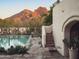 Inviting pool and spa with mountain views, complemented by desert landscaping and an elegant architectural design at 4747 E Arroyo Verde Dr, Paradise Valley, AZ 85253