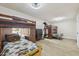 A cozy bedroom with hardwood floors and custom-built wooden bunk beds at 4854 E Evergreen St, Mesa, AZ 85205