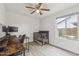 Bright, airy bedroom with a dark wood crib and desk in a well lit area at 4854 E Evergreen St, Mesa, AZ 85205