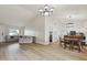 Open floor plan with living, dining, and kitchen areas, perfect for modern living at 4854 E Evergreen St, Mesa, AZ 85205