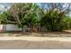 Charming home featuring mature landscaping, a two-car garage and covered front entry at 5923 W Mauna Loa Ln, Glendale, AZ 85306