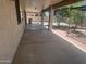 Expansive back patio extending the living space outdoors with mature trees at 6416 N 78Th Ln, Glendale, AZ 85303