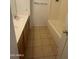Practical bathroom features double sinks and a shower-tub combination, ideal for daily routines at 6416 N 78Th Ln, Glendale, AZ 85303