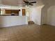Open-concept living area flows into the kitchen, perfect for seamless entertaining at 6416 N 78Th Ln, Glendale, AZ 85303