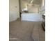 Bright living room boasts tile floors and a grand staircase, perfect for Gathering gatherings at 6416 N 78Th Ln, Glendale, AZ 85303