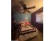Bright bedroom with a view to the exterior at 6530 W Turney Ave, Phoenix, AZ 85033