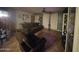Comfortable living room featuring tile flooring and neutral-toned walls at 6530 W Turney Ave, Phoenix, AZ 85033