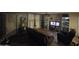Cozy living room with tile flooring and a ceiling fan at 6530 W Turney Ave, Phoenix, AZ 85033