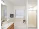 Bright bathroom featuring dual vanity, soaking tub and separate shower at 6603 W Saddlehorn Rd, Phoenix, AZ 85083