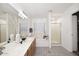 Bright bathroom features dual vanity, soaking tub and separate shower at 6603 W Saddlehorn Rd, Phoenix, AZ 85083