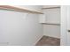 Walk-in closet with ample hanging space and tiled floors at 6603 W Saddlehorn Rd, Phoenix, AZ 85083