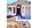 Charming home exterior with desert landscaping, stone accents, and a well-maintained facade at 6603 W Saddlehorn Rd, Phoenix, AZ 85083