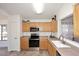 Functional kitchen equipped with stainless steel appliances and ample countertop space at 6603 W Saddlehorn Rd, Phoenix, AZ 85083