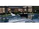 Spectacular backyard featuring a modern pool, lush landscaping, and stylish design elements for elegant outdoor living at 6649 E Ocotillo Rd, Paradise Valley, AZ 85253