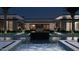 Luxury backyard oasis with a modern pool, serene water features, and manicured landscaping for resort-style living at 6649 E Ocotillo Rd, Paradise Valley, AZ 85253